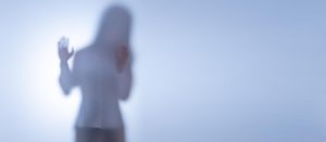 Image of a woman behind blurred glass. Is your partner struggling to cope with daily responsibilities? Depression treatment in Kent County, MI is available to help them while giving you tools to help them as well. Therapists in Grand Rapids, MI. 